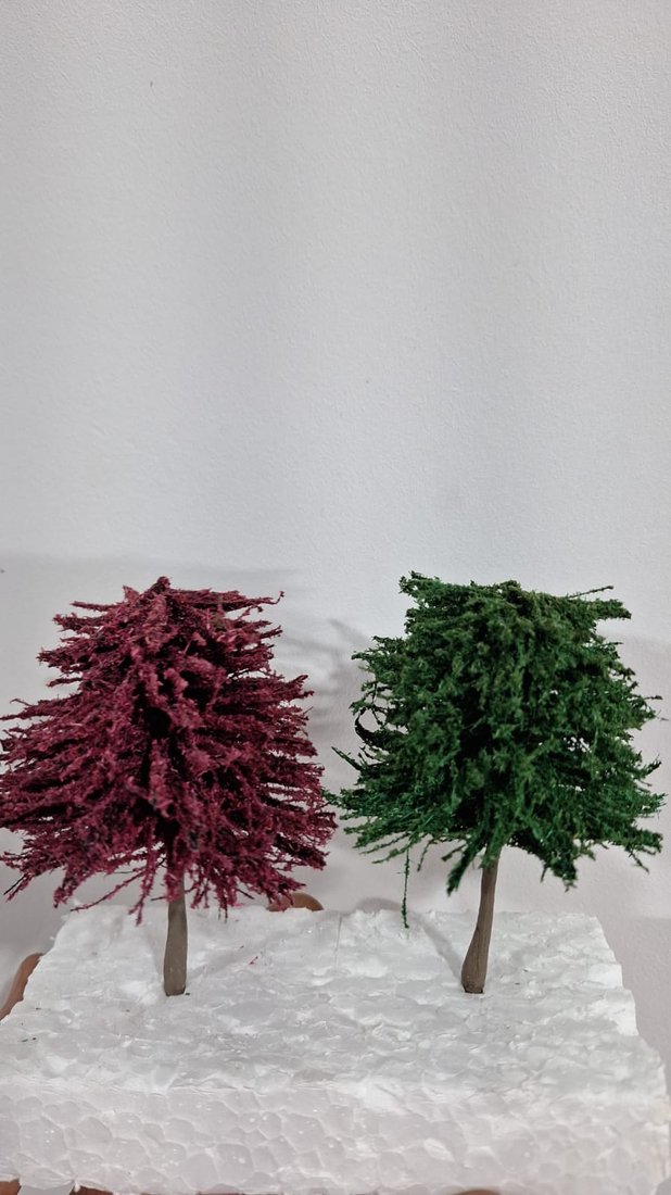 Close-up de árvores em miniatura LVL Artes
